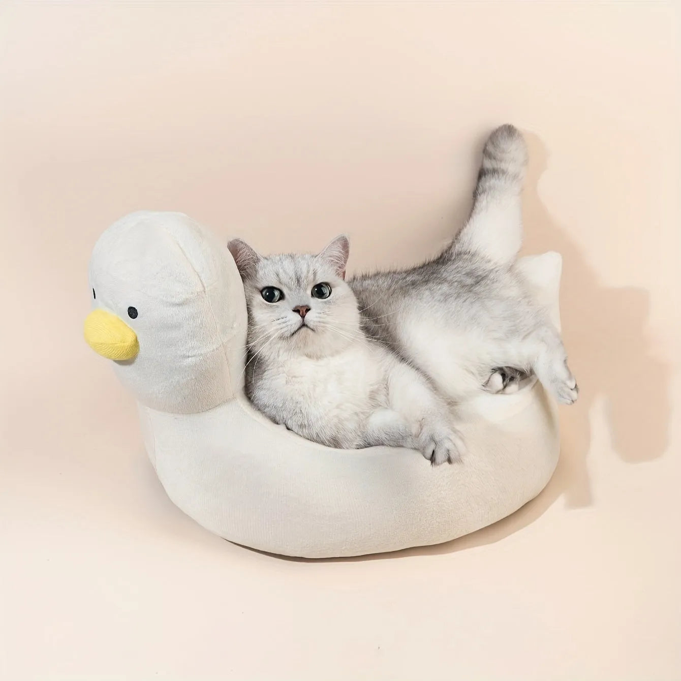 Blue duck-shaped pet bed for small dogs and cats with soft polyester material