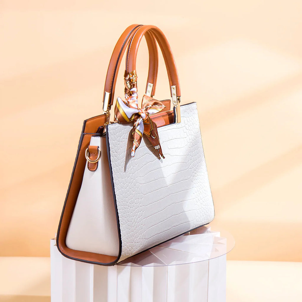 Milky white women's PU leather handbag with horizontal square shape and multiple interior compartments