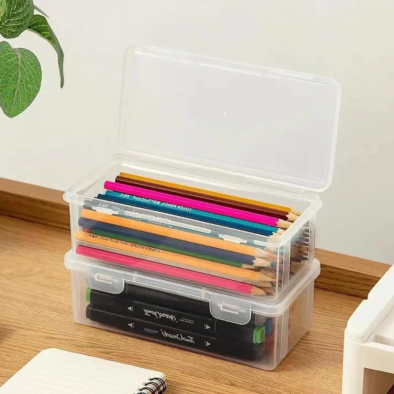 Transparent plastic pencil storage box for organising pens and drawing tools