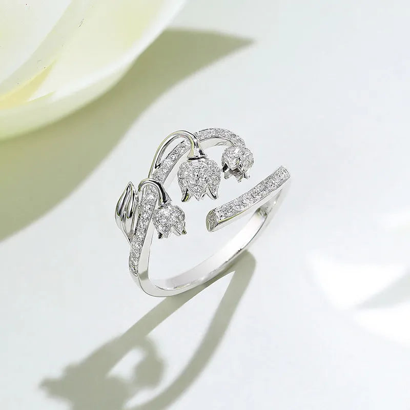 Adjustable white gold tone open ring with zircon rose, flower and lily design for women