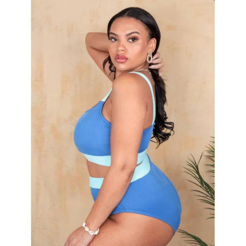 Women's solid colour high-waisted bikini set with split briefs on a mannequin.