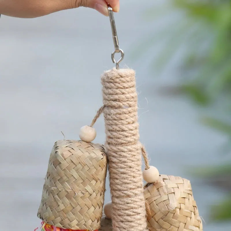 Colourful parrot shredding toy with natural wood and sisal rope measuring 15 by 35 centimetres