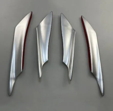Set of four ABS plastic automotive bumper spoiler air knives in carbon fibre finish