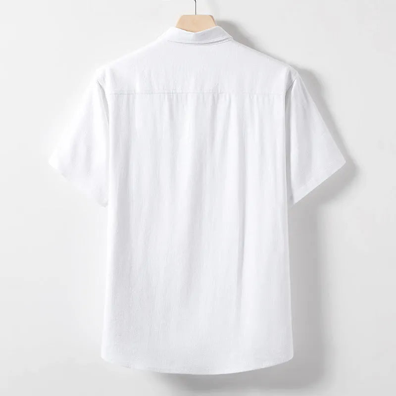 A man's loose lapel short sleeve T-shirt in a hemp blend fabric, shown in a solid colour.