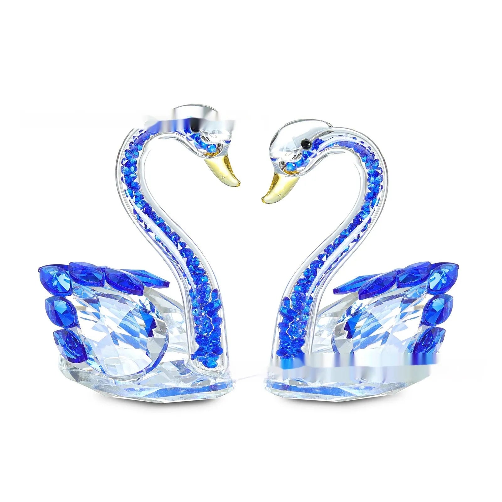 Modern white crystal swan decoration on a desk, available in red, blue, pink, and purple.
