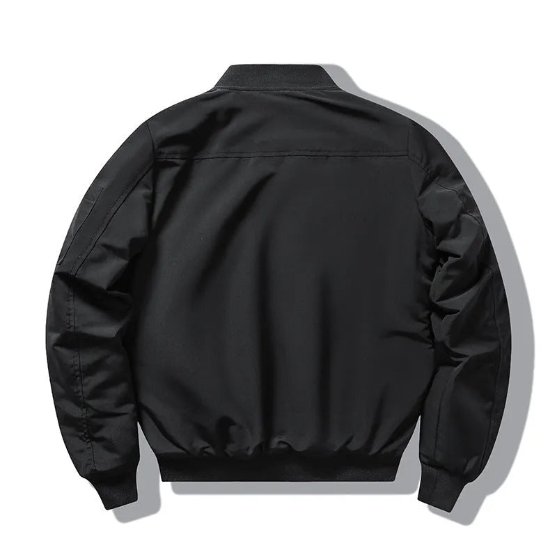 Man wearing a slim-fit black retro motorcycle jacket with stand collar and embroidery details.
