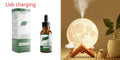 Lunar humidifier night light with spherical design, 13cm diameter, showing LED lighting and water tank