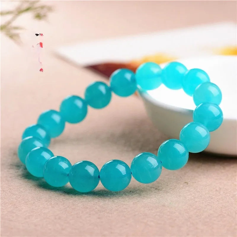 Loose 7A grade natural amazonite beads in ice colour, 12-13mm single circle size, polished finish.