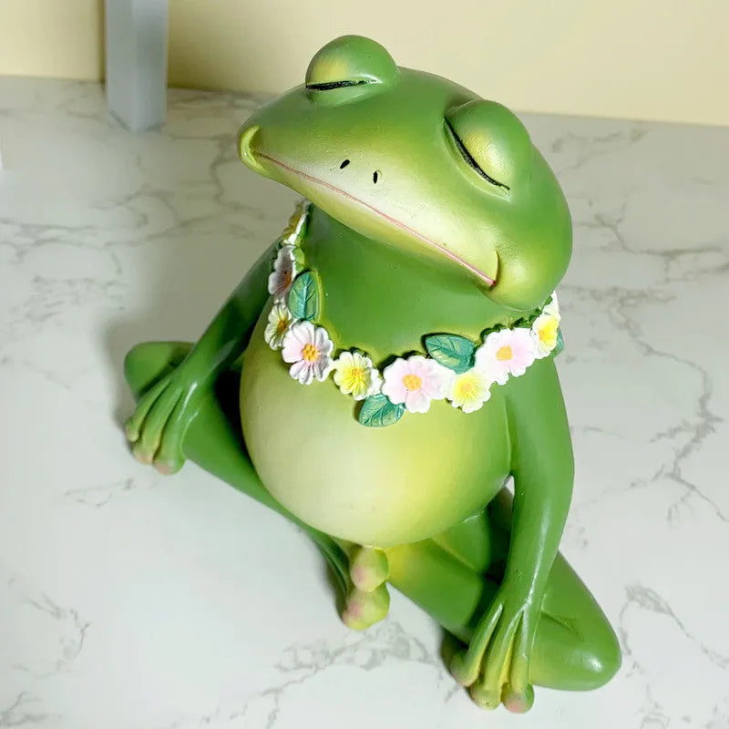 European style Magic Yoga Frog plastic and resin ornament in RDW123 colour on a shelf.
