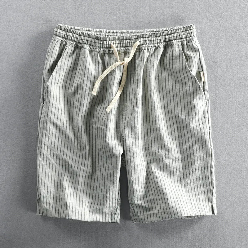 Men's striped cotton casual shorts in a loose straight-leg fit on a mid-waist.