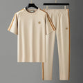 Men's blue short sleeve sports suit with matching trousers, ice silk fabric with sweat-absorbing properties