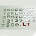 Zinc alloy metal car letter sticker in black or silver, 2.5cm size, for vehicle personalisation.