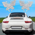 White diamond glass car sticker with butterfly and bear claw design, 7cm by 6cm.