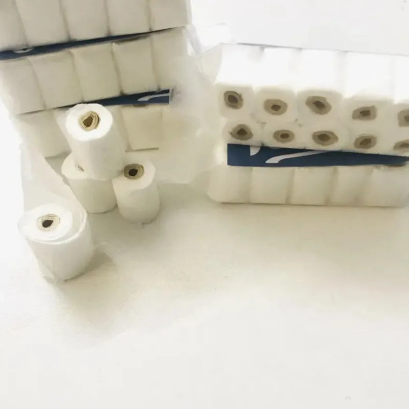 Small paper model of a tissue roll on a core, measuring 30mm by 15mm by 80mm.