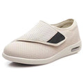 Beige leisure shoes with a Velcro strap closure and a round toe.