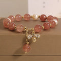 Freshwater pearl and strawberry quartz bracelet with zircon accents and bee charm