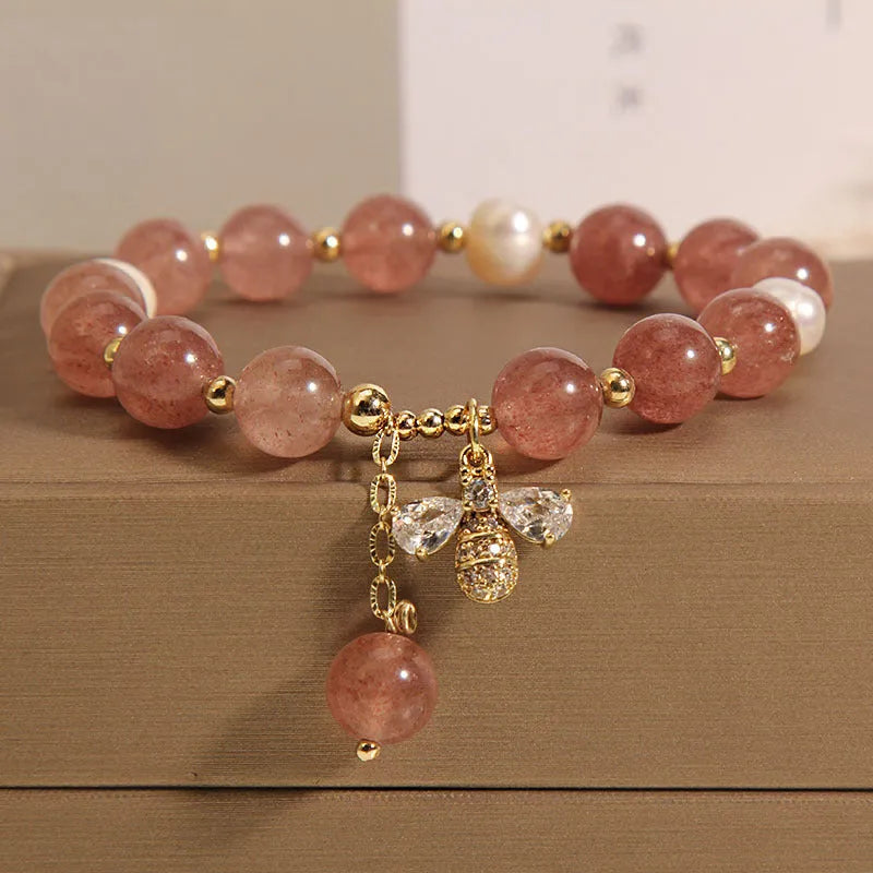 Freshwater pearl and strawberry quartz bracelet with zircon accents and bee charm
