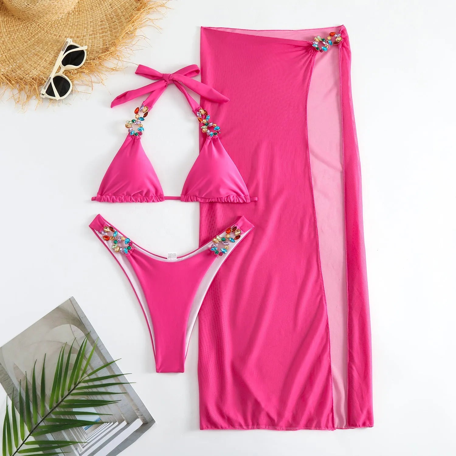 Women's rose red three-piece bikini set with long mesh skirt for swimming.