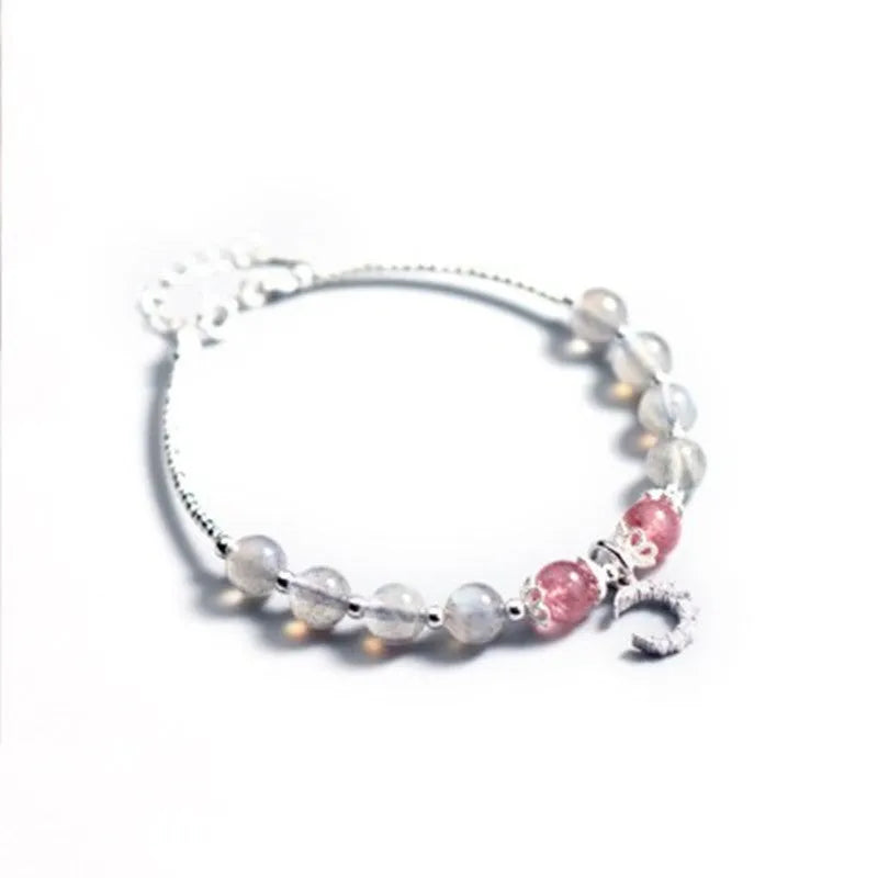 Natural moonstone handmade bracelet with crescent moon and crystal charms on adjustable chain