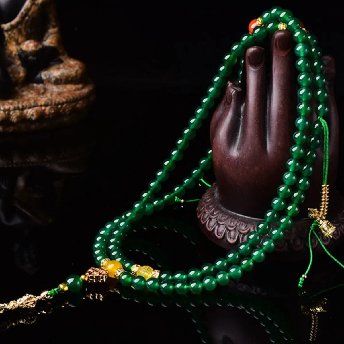 Handmade multi-strand green agate bracelet from Brazil on a wrist, showing stone sizes 6mm, 8mm, and 10mm.