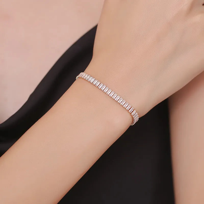 Women's geometric brass bracelet with full diamond zircon look in quadrilateral design