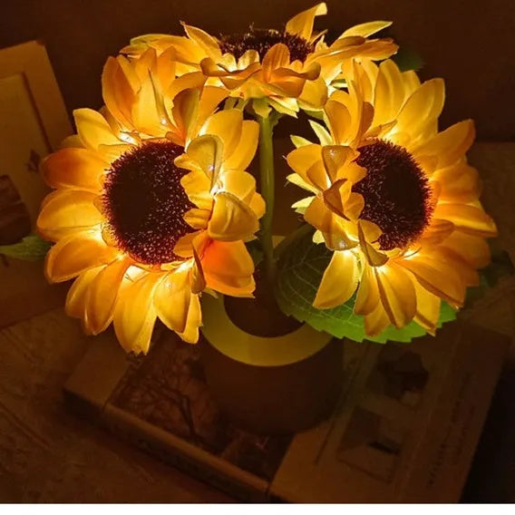 USB rechargeable artificial sunflower LED night light on table with decorative flower design