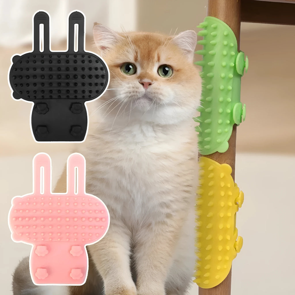 Silicone cat grooming massage comb with adjustable strap mounted on a table leg.