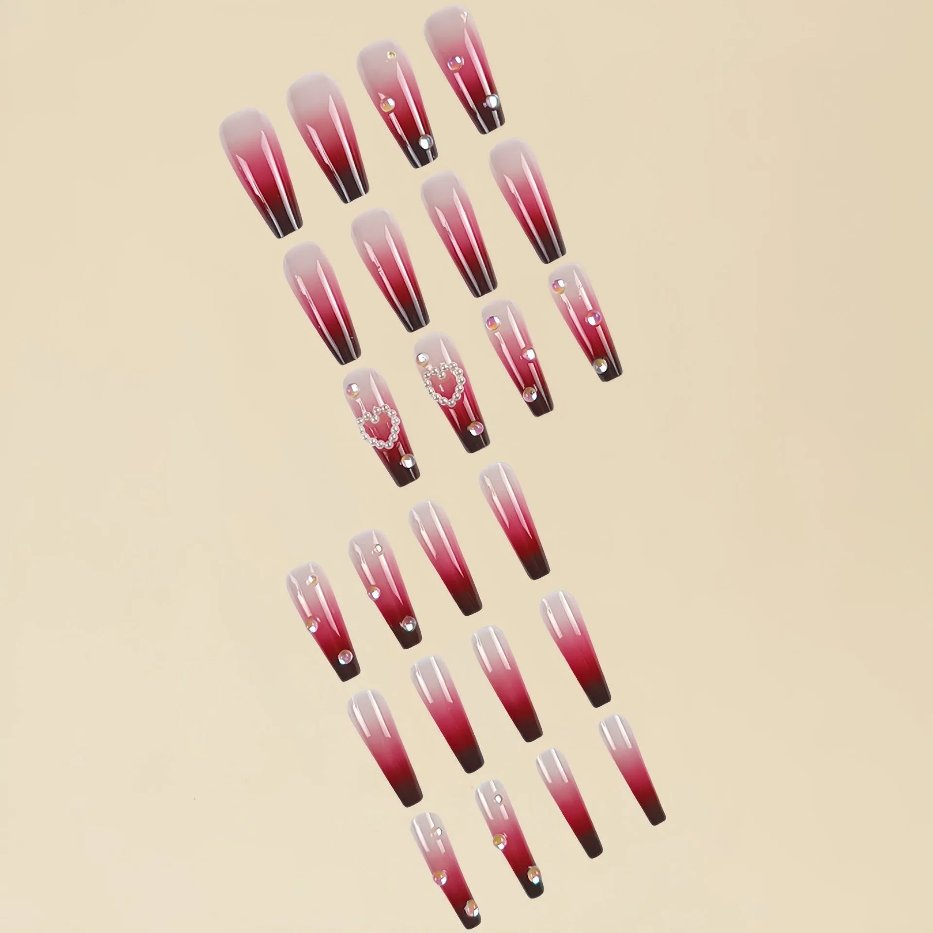Wine red gradient fake nail tips with heart and plaid pattern, long ballet style, shown with jelly glue and rubbing cloth.
