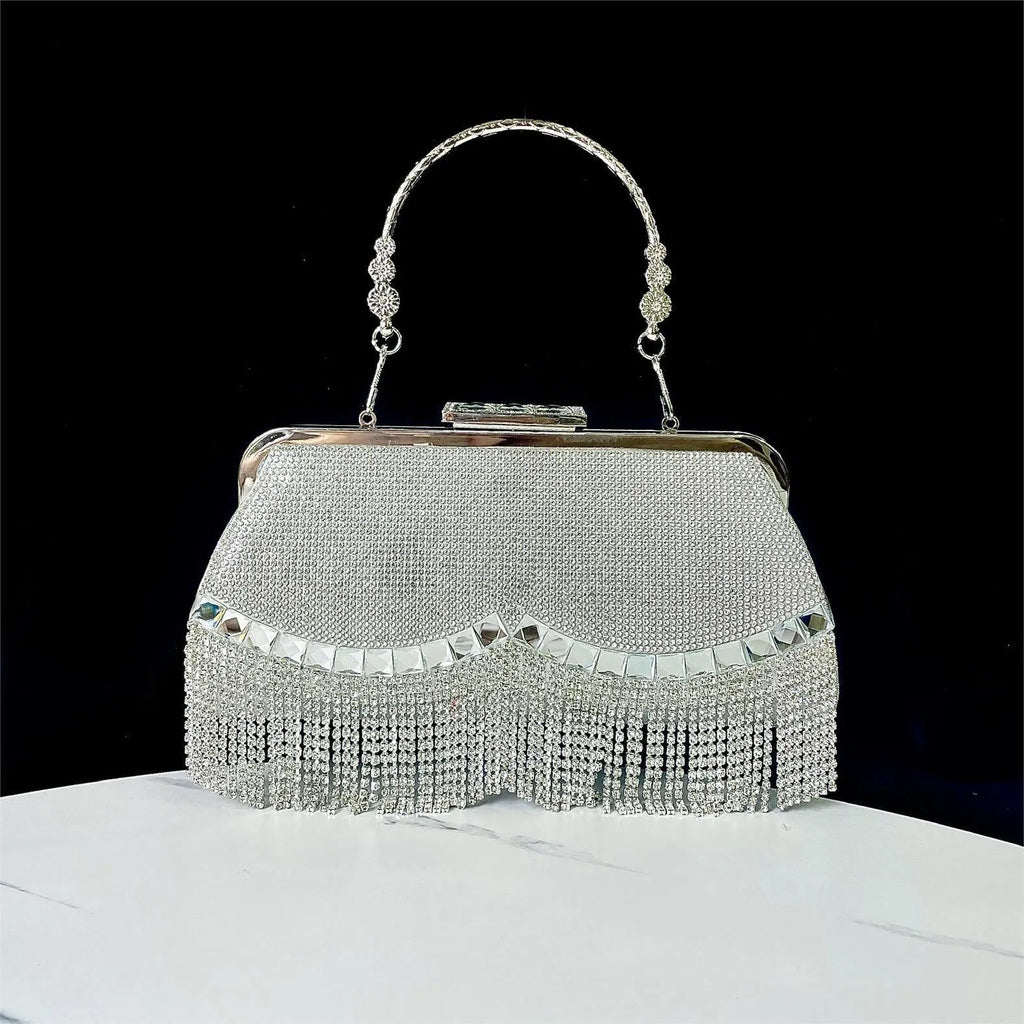 Tassel banquet bag in silver, gold or black polyester with shell shape and chain detail
