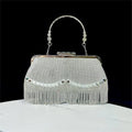 Tassel banquet bag in silver, gold or black polyester with shell shape and chain detail