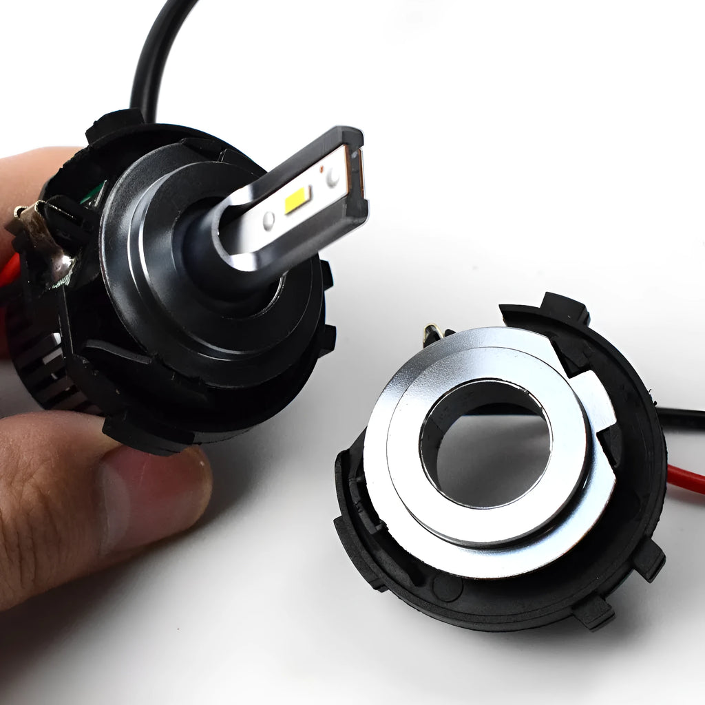 Black H7 LED headlight adapter bracket for Volkswagen vehicles with copper wire connections