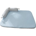 Blue big-eyed monster design pet bed cushion for dogs on a wooden floor.