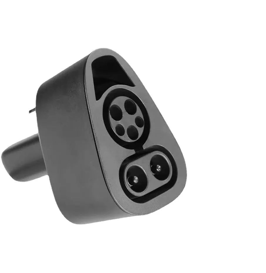 Black Tesla charging plug conversion adapter for J1772 connectors with dimensions 195mm x 96mm x 67mm