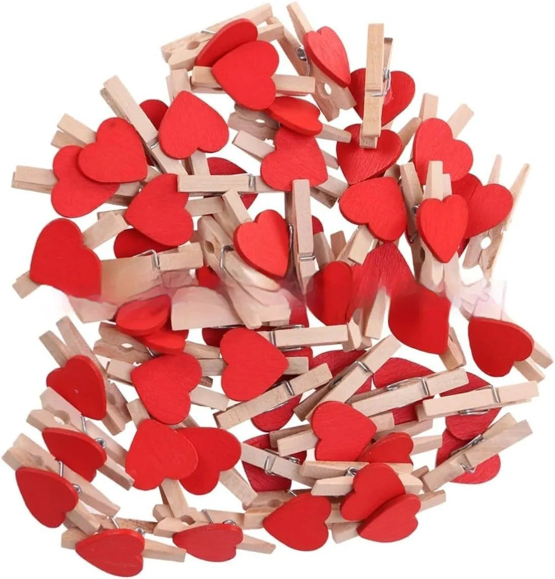 Set of five handmade solid wood heart-shaped clips in red, rose red, and white colours on a plain background.