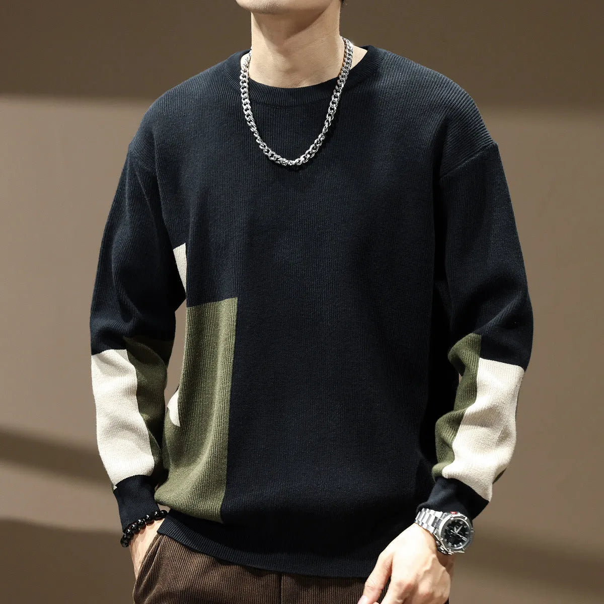Men's oversized pullover sweater in black or walnut with colour contrast patchwork and long sleeves