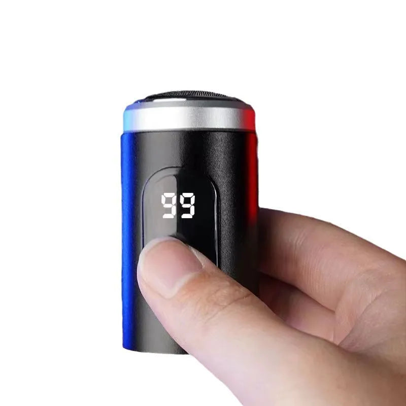 Black portable USB rechargeable shaver with LED display on a clean background.