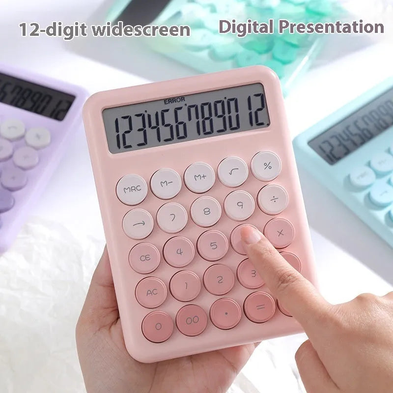 A gradient colour desk calculator on a desk, showing violet, mint green, blue, and pink colour options.