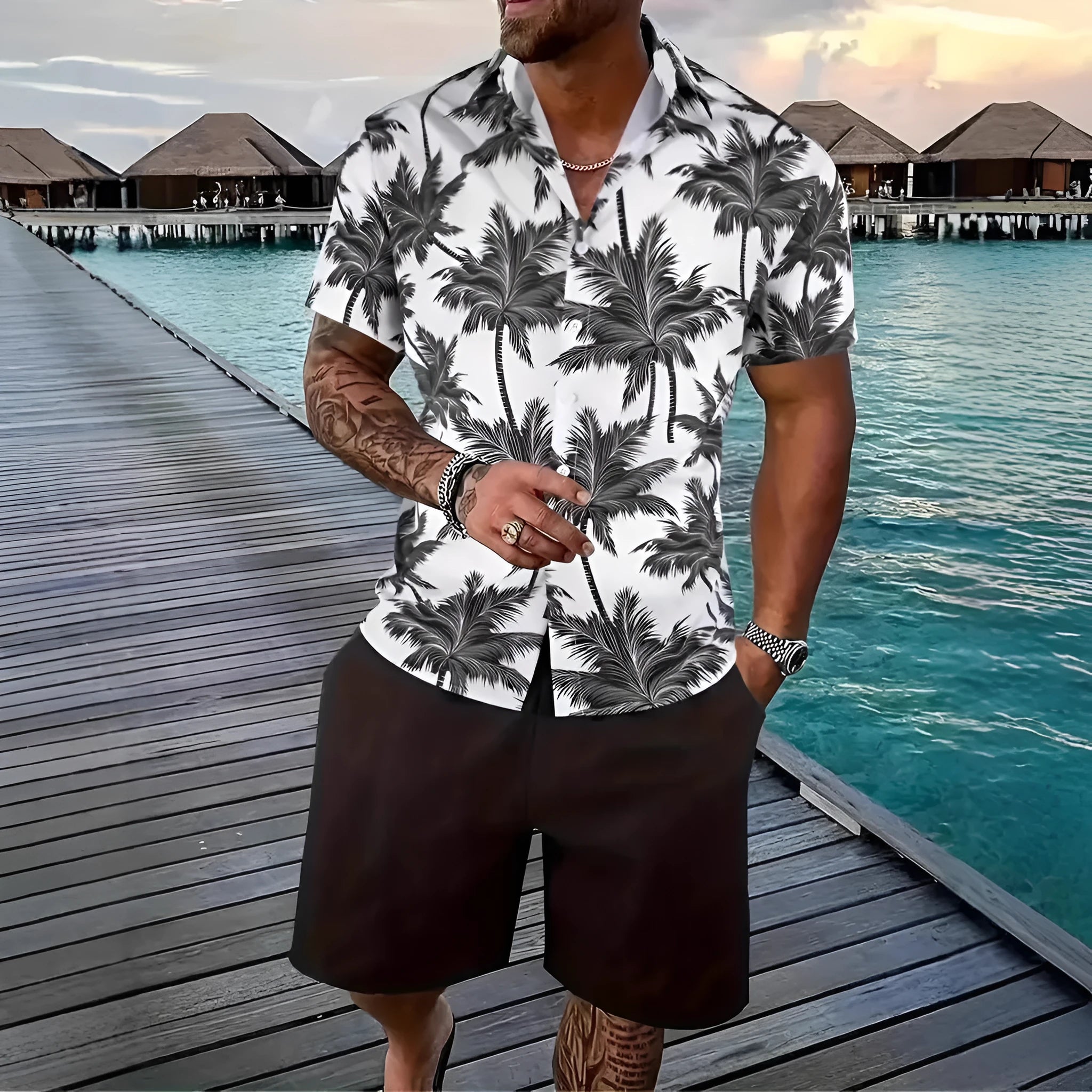 Men's Hawaiian style short sleeve shirt and shorts casual suit set on a hanger.