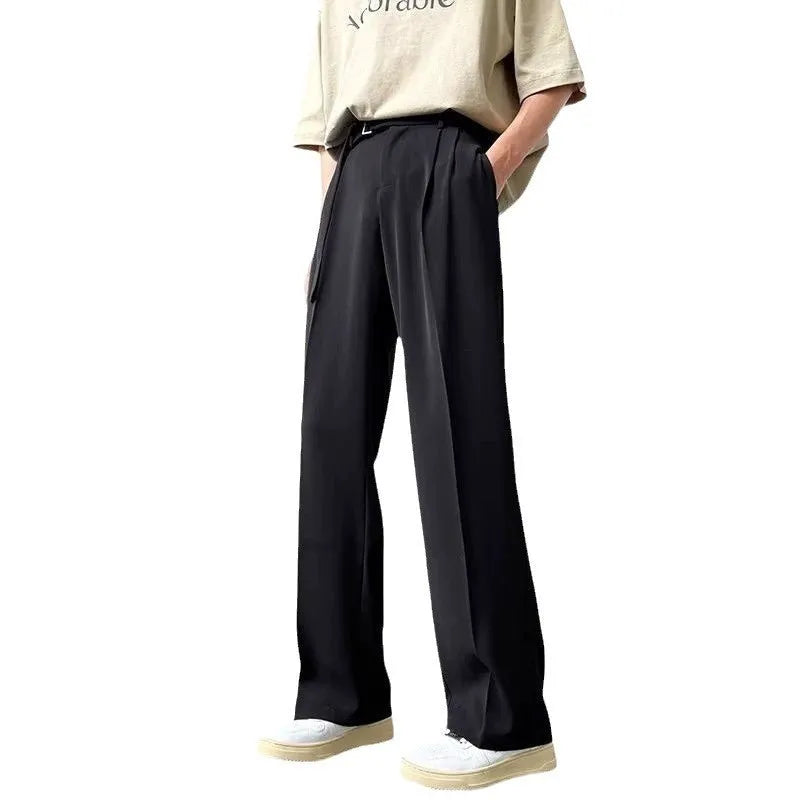 Black straight leg loose fit casual trousers on a hanger, front view.
