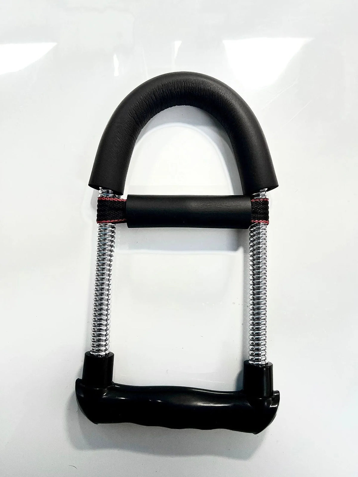 Spring steel hand gripper wrist strength device with 45LB resistance in black finish