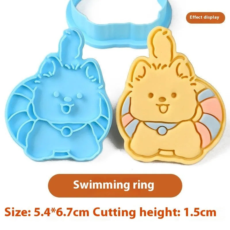 Plastic press mould for making puppy-shaped biscuits and soft candies with cartoon designs.