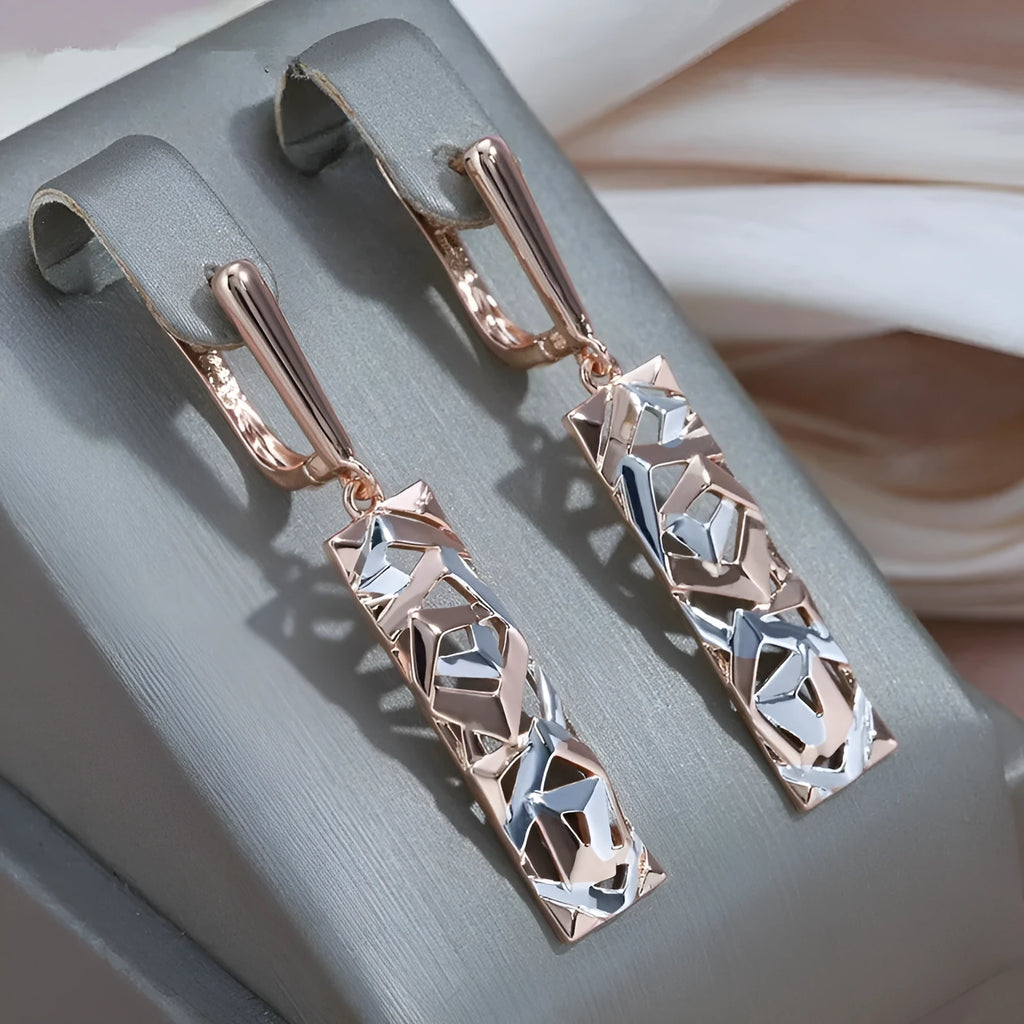 Rectangular two-tone hollow stud earrings with geometric design and electroplated finish