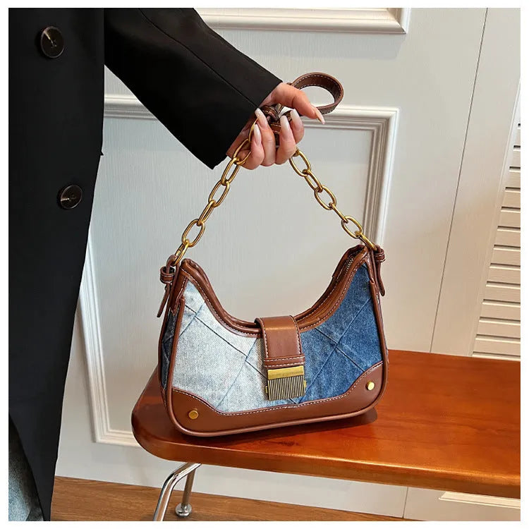 Brown denim women's bucket shoulder bag with diamond chain straps and lock detail