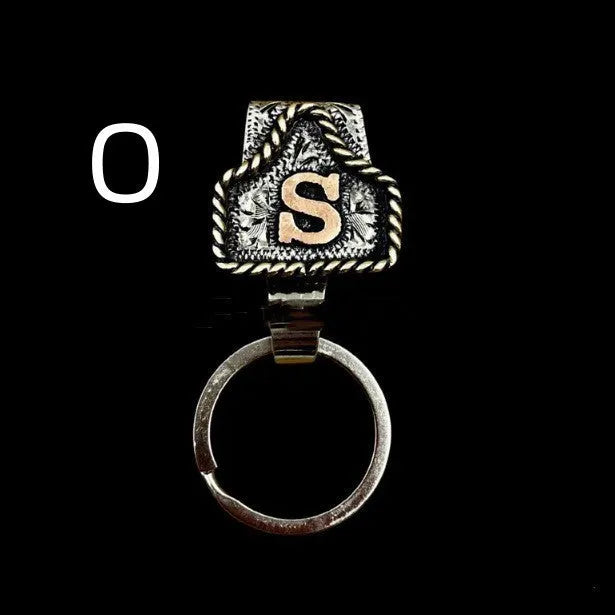 Handmade metal cow tag belt keychain in rustic design with multiple colour options