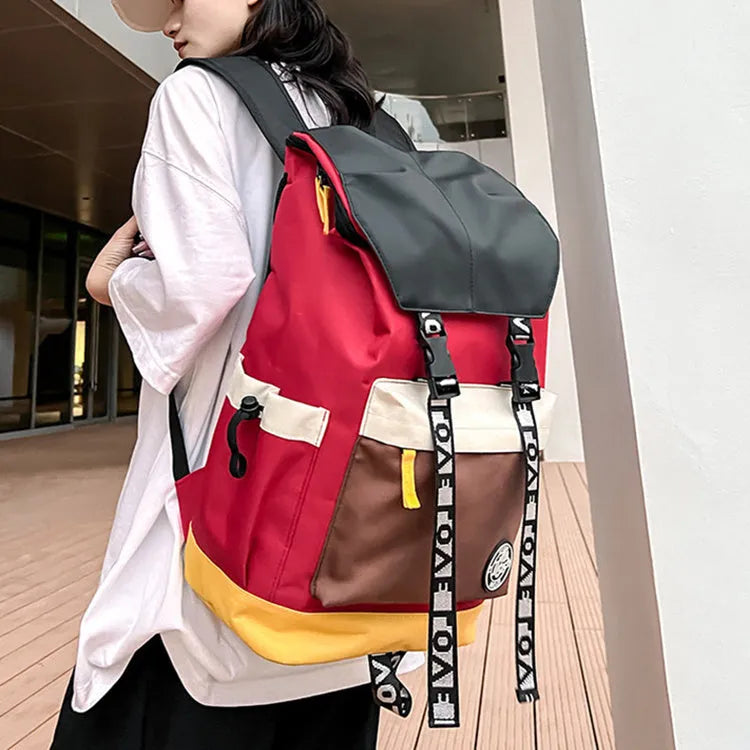 Oxford cloth school backpack in black, green, or red colour options.