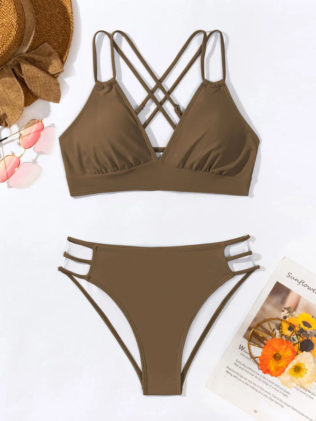 Women's black V-neck halter bikini with removable padded bra and split shorts.