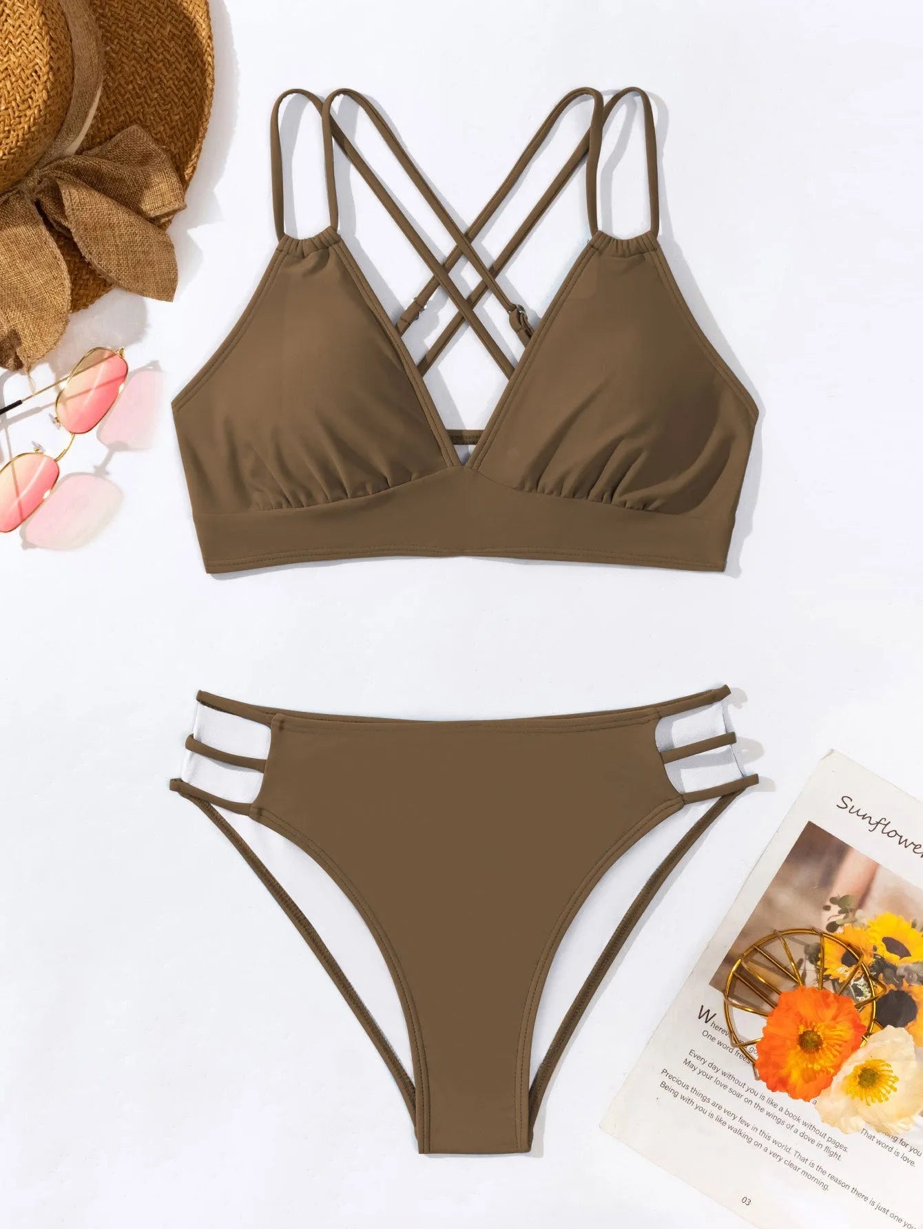 Women's black V-neck halter bikini with removable padded bra and split shorts.