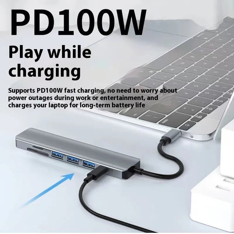 A Type-C multi-function expansion dock with HDMI, USB ports, and card slots on a 15 cm cable.