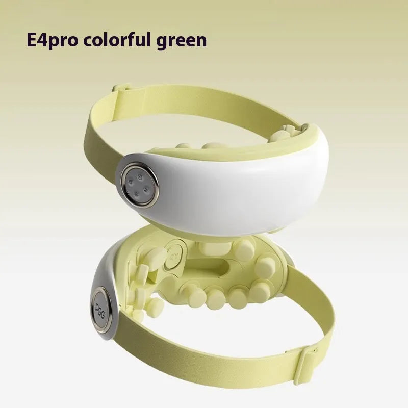 Purplish Gray Bluetooth eye hot compress massager with USB charging cable on a table.