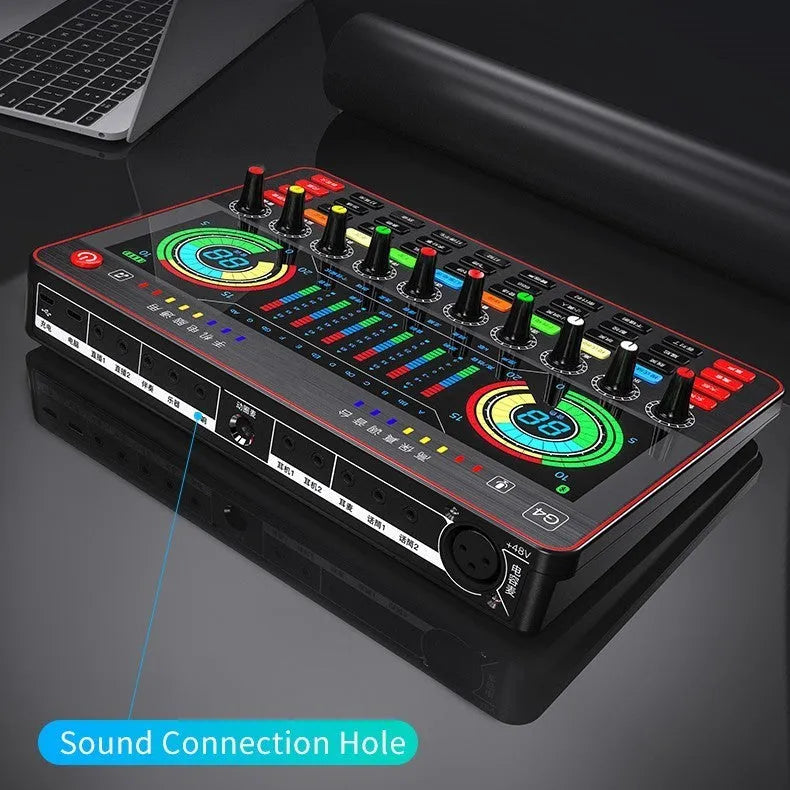G4 professional sound card set with LCD screen, microphone, remote control, and cables on a desk.